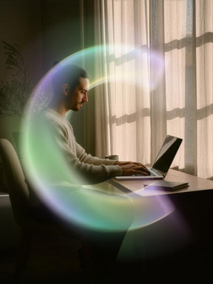 Man at desk with laptop