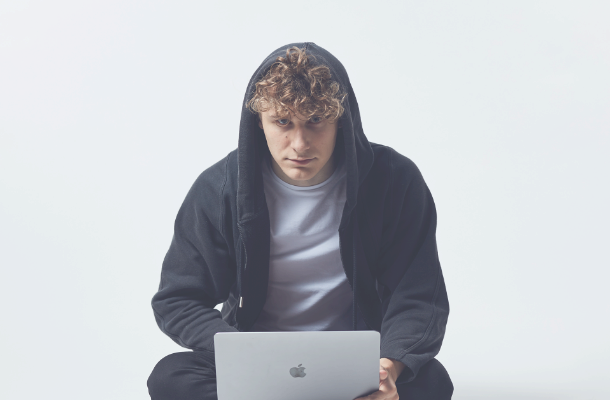 Crypto-scammer laptop-content-610x400.