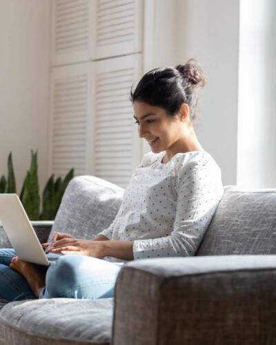 Account takeover-women sofa laptop-content-800x1000