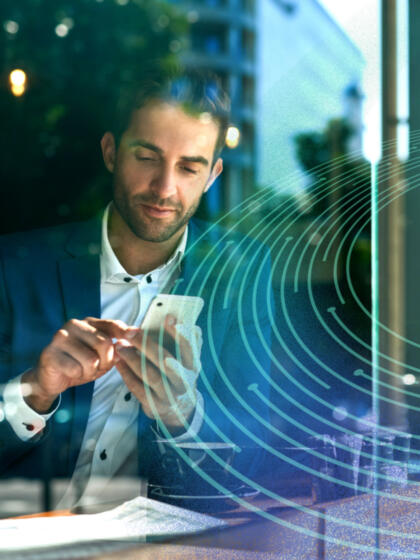 Account creation & registration-man looking at phone with orchestration overlay-content-840x1120