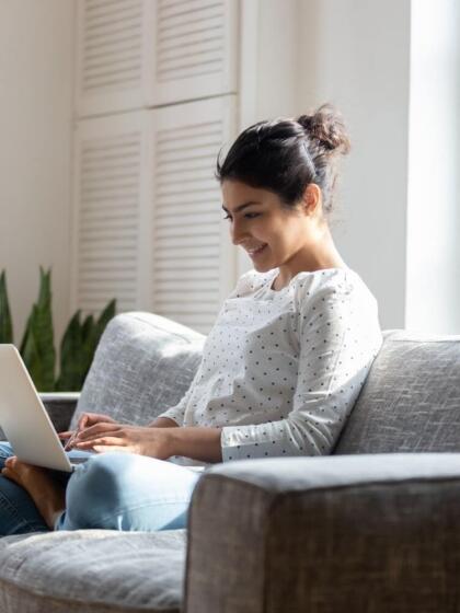 Account takeover-women sofa laptop-content-800x1000