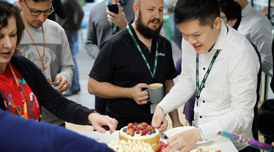 Careers-employees eating cake-content-900x500.jpg
