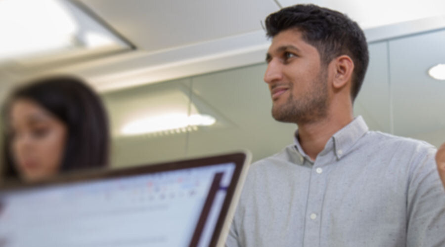 Careers engineering-man behind laptop-content-900x500